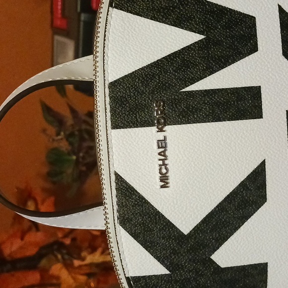 Michael kors purse backpack, white leather, with black MK on it. - Picture 3 of 4